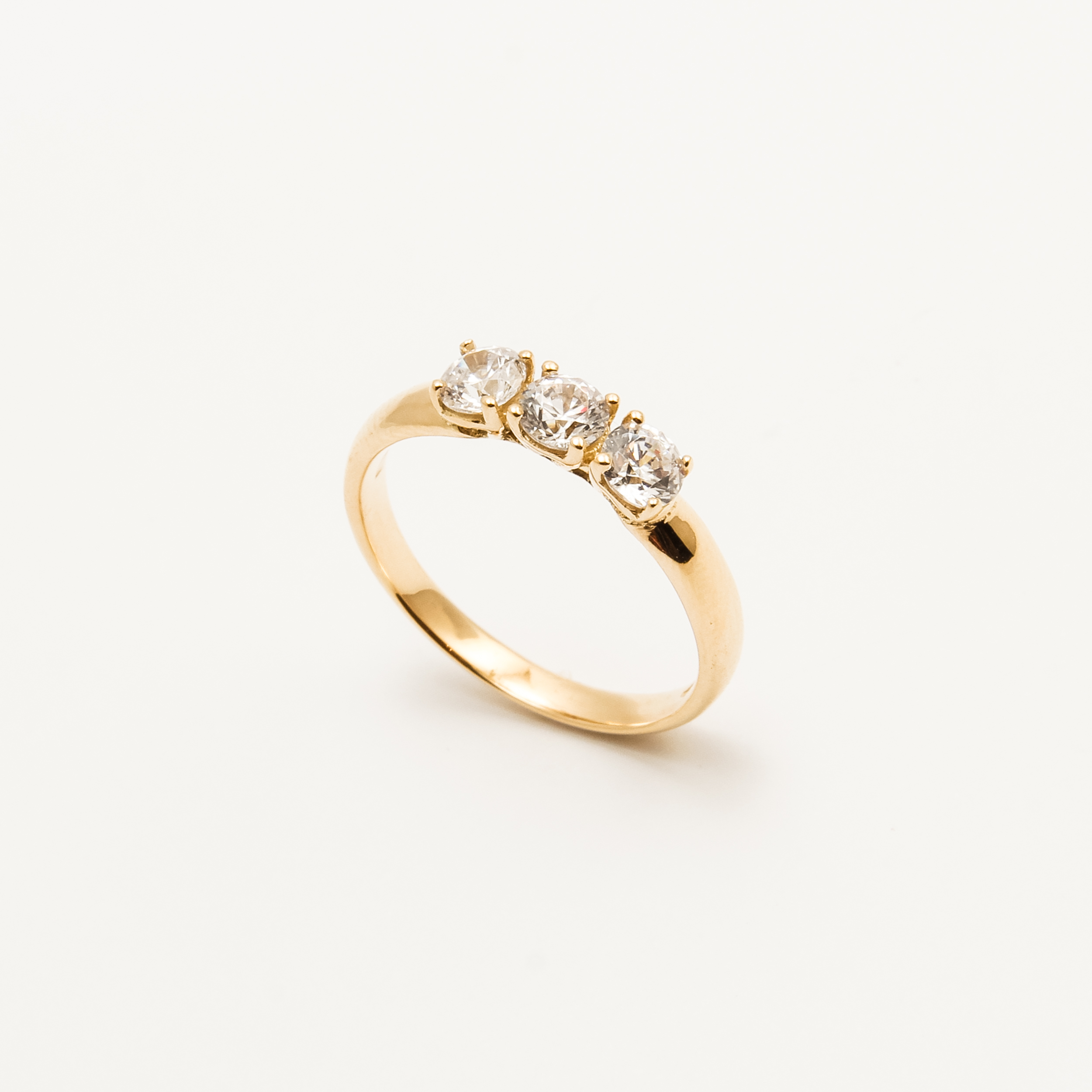 Trilogy Oro 18kt e Zirconi