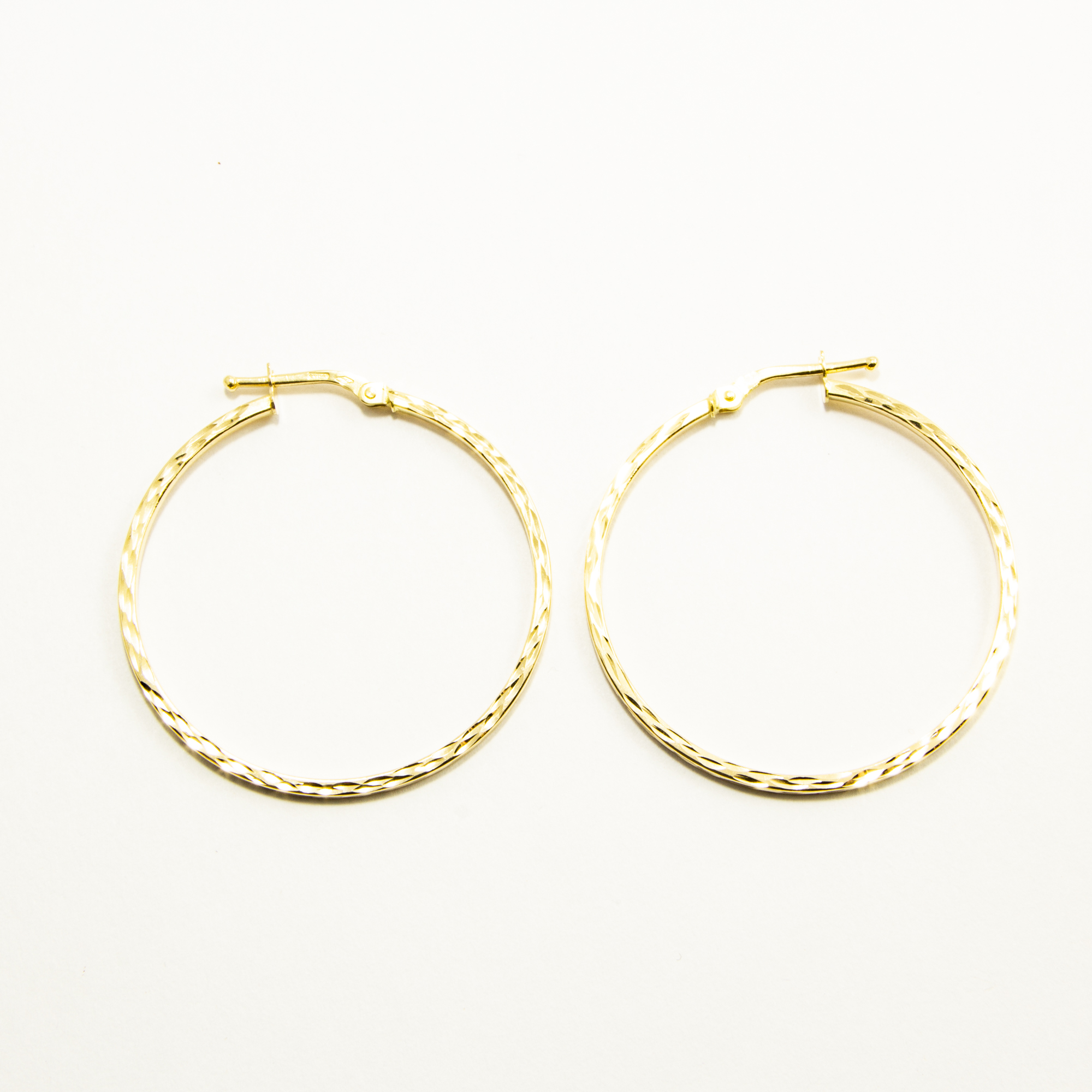 Grandi Orecchini in Oro18Kt Martellati